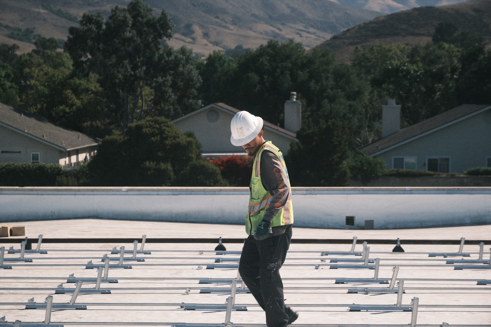 MYNT electrician working on a commercial solar installation
